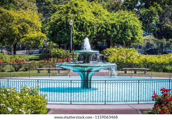 Water Fountain Surrounded By Blooming Roses Stock Photo Edit Now