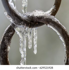 Water Frozen Solid While Running Down Copper Ring Downspout