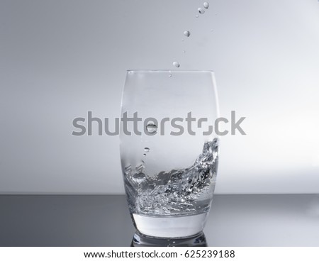 Water glass filled with fresh water