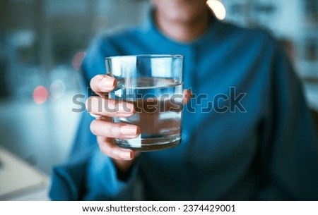 Water, glass and hand closeup in office, woman and giving for hydration, wellness or choice at finance company. Accountant, natural drink and zoom for nutrition, diet or detox for health in workplace