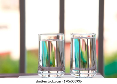 Water In Glass On Counter Background And Space For Text 