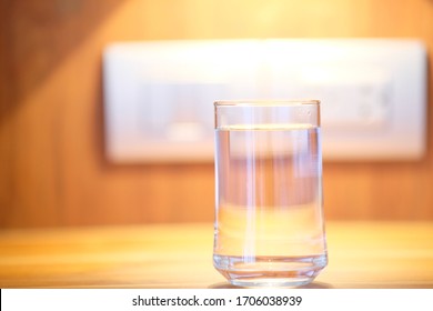 Water In Glass On Counter Background And Space For Text 