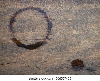 Water glass stains and drop of water on wooden table background
