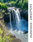 Water gushes down at Snoqualmie Falls in Washington State.