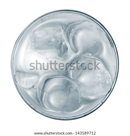 Water with ice in a glass, top view