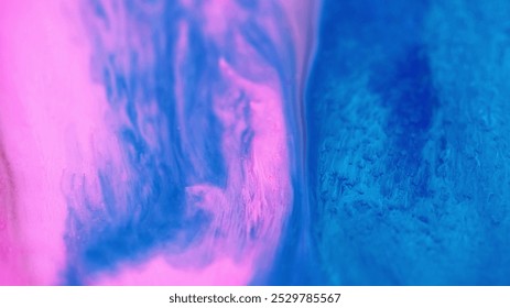 Water ink drop. Magic fluid mix. Defocused clear neon blue pink color underwater ink flow liquid blend abstract art background. - Powered by Shutterstock