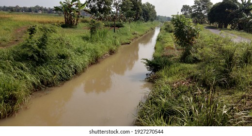 The Water Irrigation Channel Serves To Supply Water To The Rice Fields During The Rainy And Dry Seasons