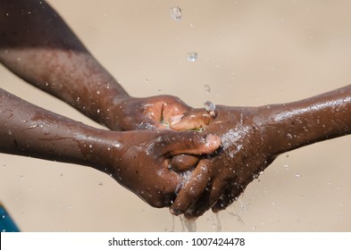 Water Issues In Africa - Black Children Washing Hands