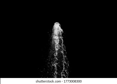 Water Jet Rising Up And Splashing On A Black Background, Abstract 