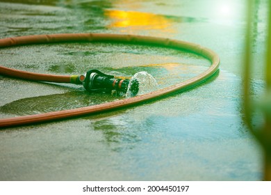 
Water Jet Splashing From A Fire Fighting Firehose Nozzle.