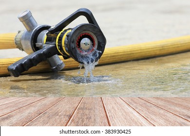 Water Jet Splashing From A Fire Fighting Firehose Nozzle