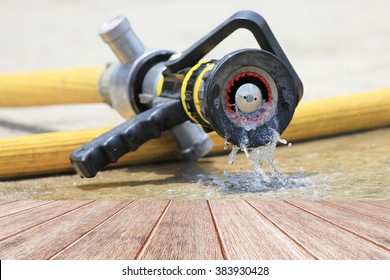 Water Jet Splashing From A Fire Fighting Firehose Nozzle