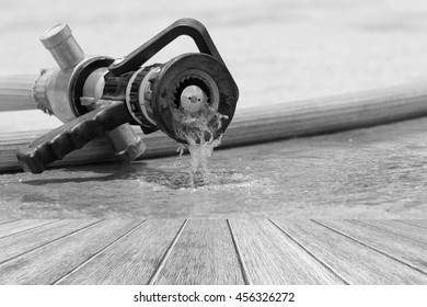 Water Jet Splashing From A Fire Fighting Firehose Nozzle