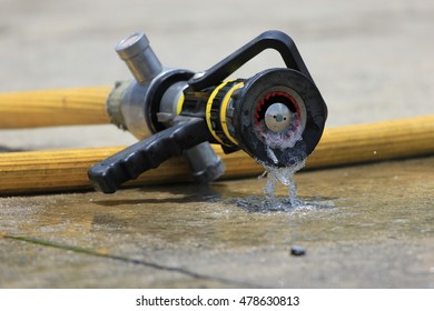 Water Jet Splashing From A Fire Fighting Firehose Nozzle