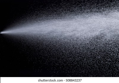 Water Jet Spraying On Black Background