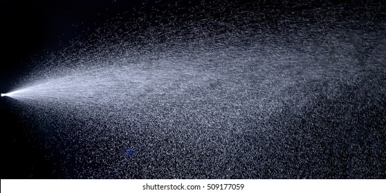 Water Jet Spraying On Black Background