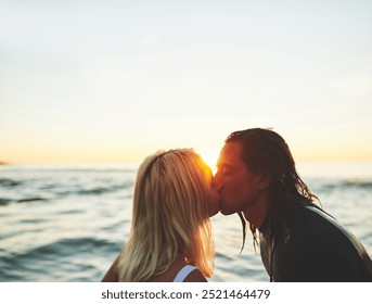 Water, kiss or couple at beach for love or romance on vacation, valentines day or holiday. Sunset, surfer or people in ocean for bonding, surfing or sports at sea for surfing trip on tropical island - Powered by Shutterstock