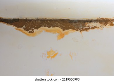 Water Leakage On The Wall With Streaks Of Rust And Mold