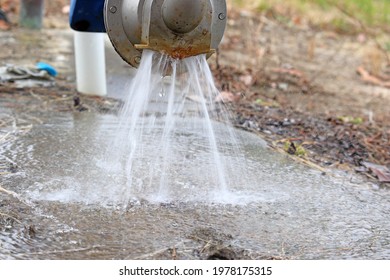 Water leaking from a main fire hydrant