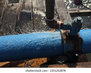 Water Leaking From The Water Pipe Line On The Wooden Jetty