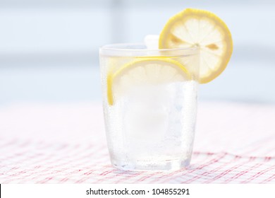 Water With Lemon And Lime In A Glass With Ice