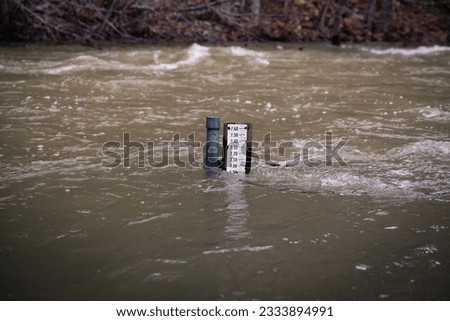 Water level depth meter in river 