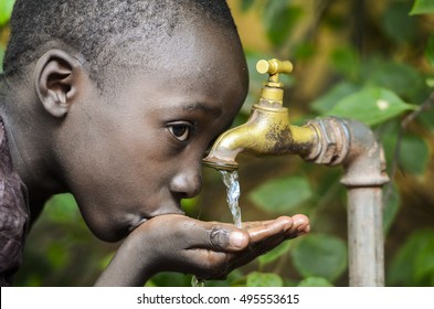 Water Is Life! African Baby Boy Drinking Water (Drought Symbol)