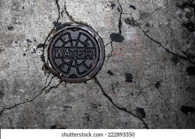 Water Man Hole In The Concrete