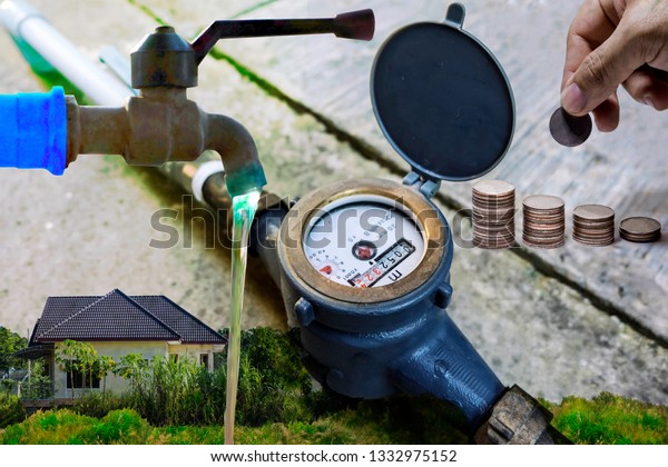 Water meter on concrete with home and green nature\
background, Measuring device, Open cover of water meter to check\
counter number of water consumption, water pipe and meter with\
waterspout of home