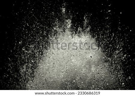 Water mist caused by the eruption of hot springs,black background image