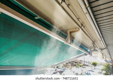 Water Mist Cooling System On Ceiling Lowers Ambient Temperature At Restaurant In Hot Tropical Climate