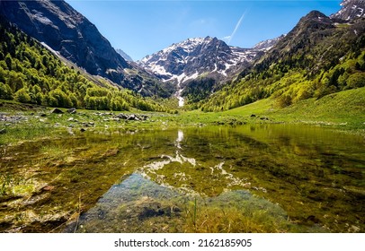 Water in a mountain valley. Mountain valley landscape. Beautiful mountain landscape. Water in mountains