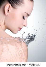 Water On The Shoulder Of Beautiful Woman With Clean Skin - Vertical