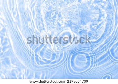 Water panoramic banner background. Water texture; water surface with rings and ripple. Spa concept background. Flat lay; top view; copy space; composition with copy-space.