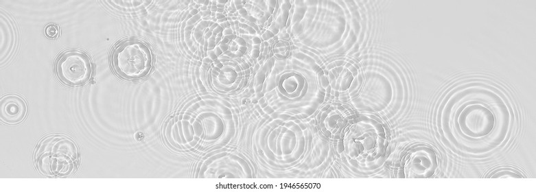 Water panoramic banner background. White water texture, blue mint water surface with rings and ripple. Spa concept background. Flat lay, top view, copy space, square composition with copy-space. - Shutterstock ID 1946565070