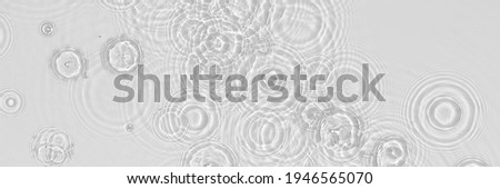 Water panoramic banner background. White water texture, blue mint water surface with rings and ripple. Spa concept background. Flat lay, top view, copy space, square composition with copy-space.