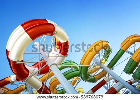 Water park with water colored flights and pools.