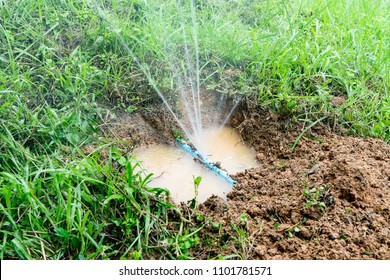 Water Pipe Break,leaking From Hole In A Hose  Connection Joint Of Plastic Pipes Water Supply System,selective Focus