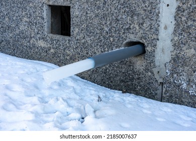 A Water Pipe In A House With A Frozen Piece Of Ice. Rainwater Harvesting