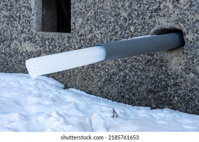 A Water Pipe In A House With A Frozen Piece Of Ice. Rainwater Harvesting