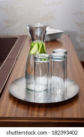 Water in pitcher on wood furniture serving for VIP 