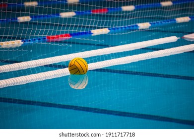 Water polo action in a swimming pool
