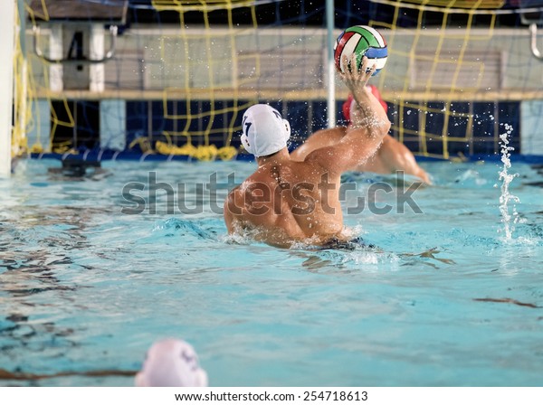water polo players on\
swimming pool 