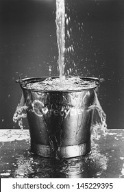 Water Pouring In Bucket