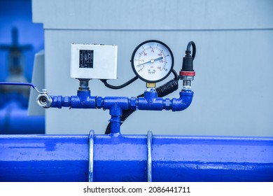 The Water Pressure Regulator Is Located On The Rooftop Of A Hotel.