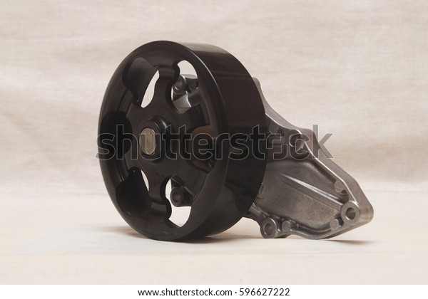 water pump, an element of the engine cooling\
system on white\
background