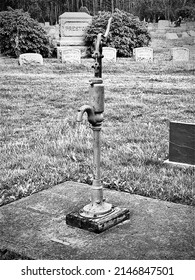 Water pump in local cemetery in blackwhite