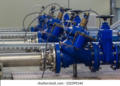 Water pumping station with booster pump control valves.