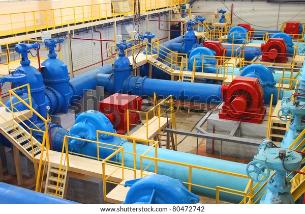 Water\
pumping station, industrial interior and\
pipes