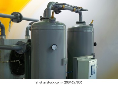 Water Purification Equipment. Gray Cylinders For Water Cleaning. Water Purification System At The Enterprise. Gray Balloon With Pressure Sensor. Industrial Liquid Purification System.